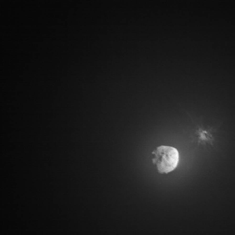 Image captured by the Italian Space Agency’s LICIACube a few minutes after the intentional collision of NASA’s Double Asteroid Redirection Test (DART) mission with its target asteroid, Dimorphos, captured on Sept. 26, 2022.