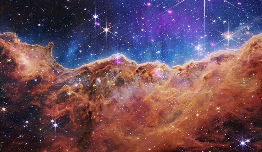 Composite image of the Carina Nebula using JWST and Chandra data.