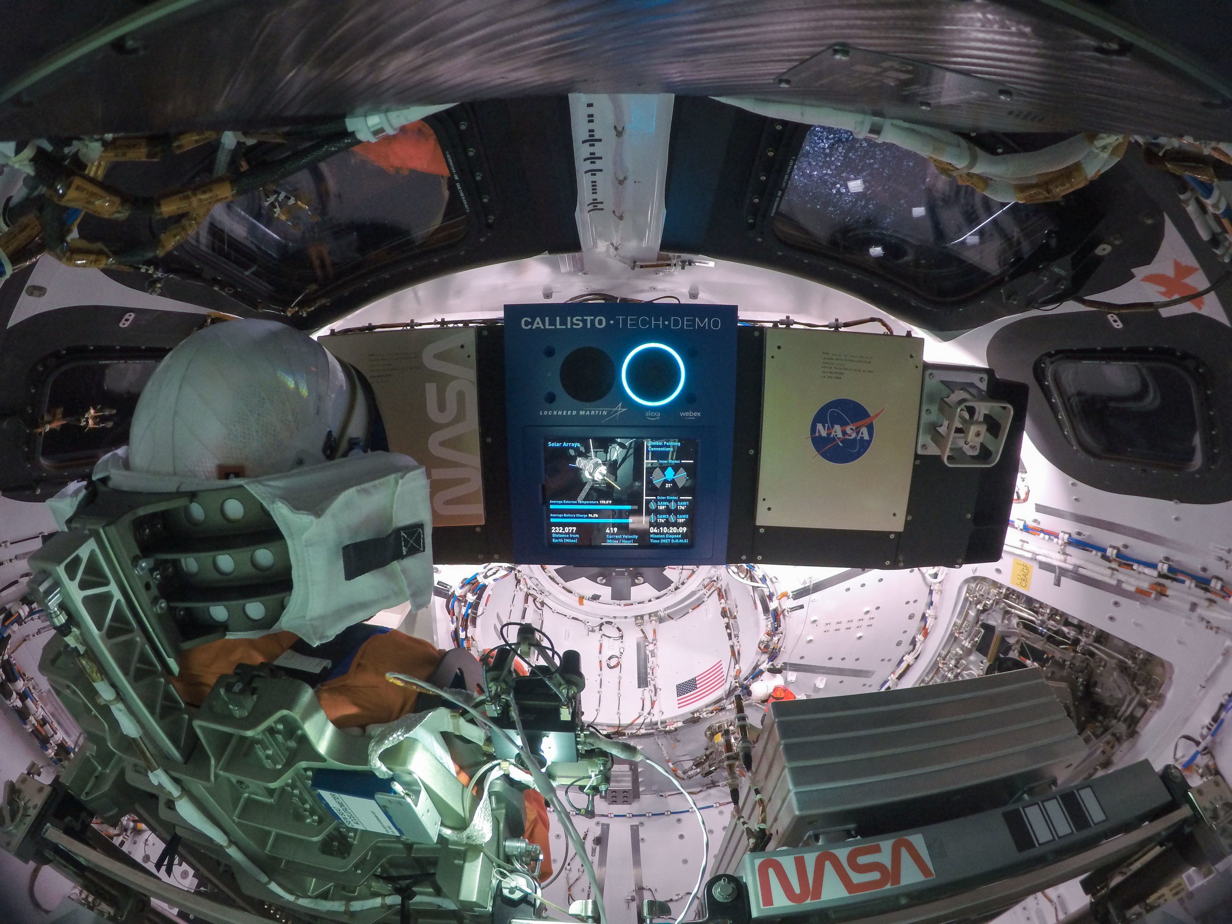 This high-resolution image captures the inside of the Orion crew module on flight day one of the Artemis I mission. At left is Commander Moonikin Campos, a purposeful passenger equipped with sensors to collect data that will help scientists and engineers understand the deep-space environment for future Artemis missions. At center is the Callisto payload, a technology demonstration of voice-activated audio and video technology from Lockheed Martin in collaboration with Amazon and Cisco. Below and to the right of Callisto is the Artemis I zero-gravity indicator, astronaut Snoopy.