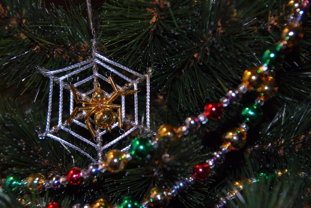 christmas tree ornament showing a spider on a web