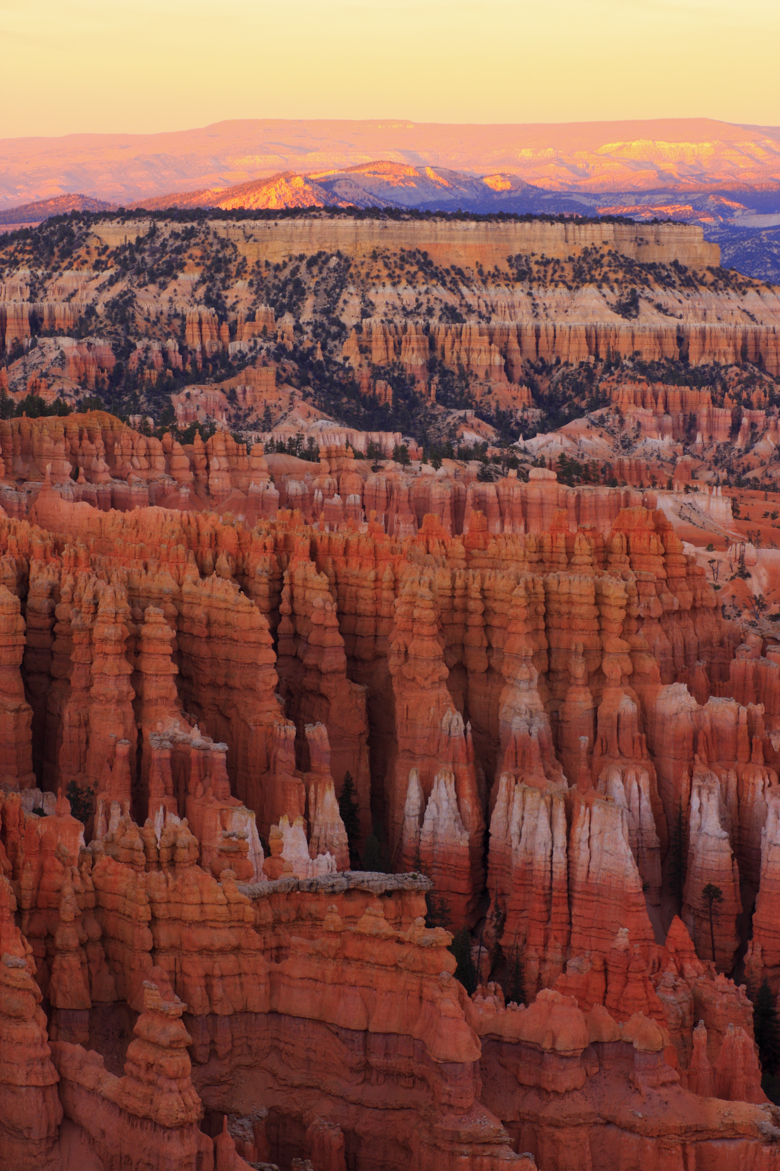 sunrise over bryce canyon hoodoo rock formations