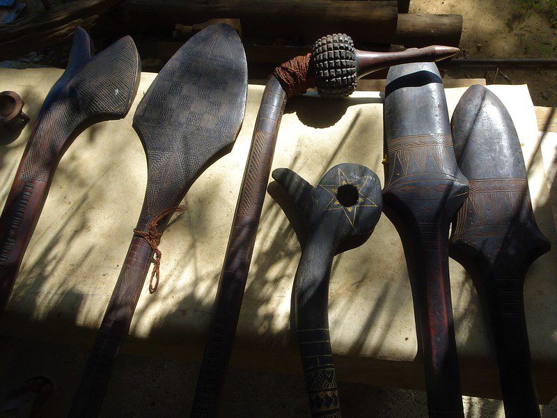 Fijians have a long tradition of intricately carving wooden clubs, like those shown here. 