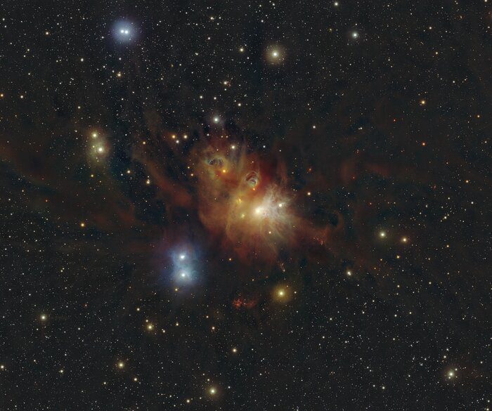 This image shows the regions around the Coronet star cluster in the Corona Australis constellation.