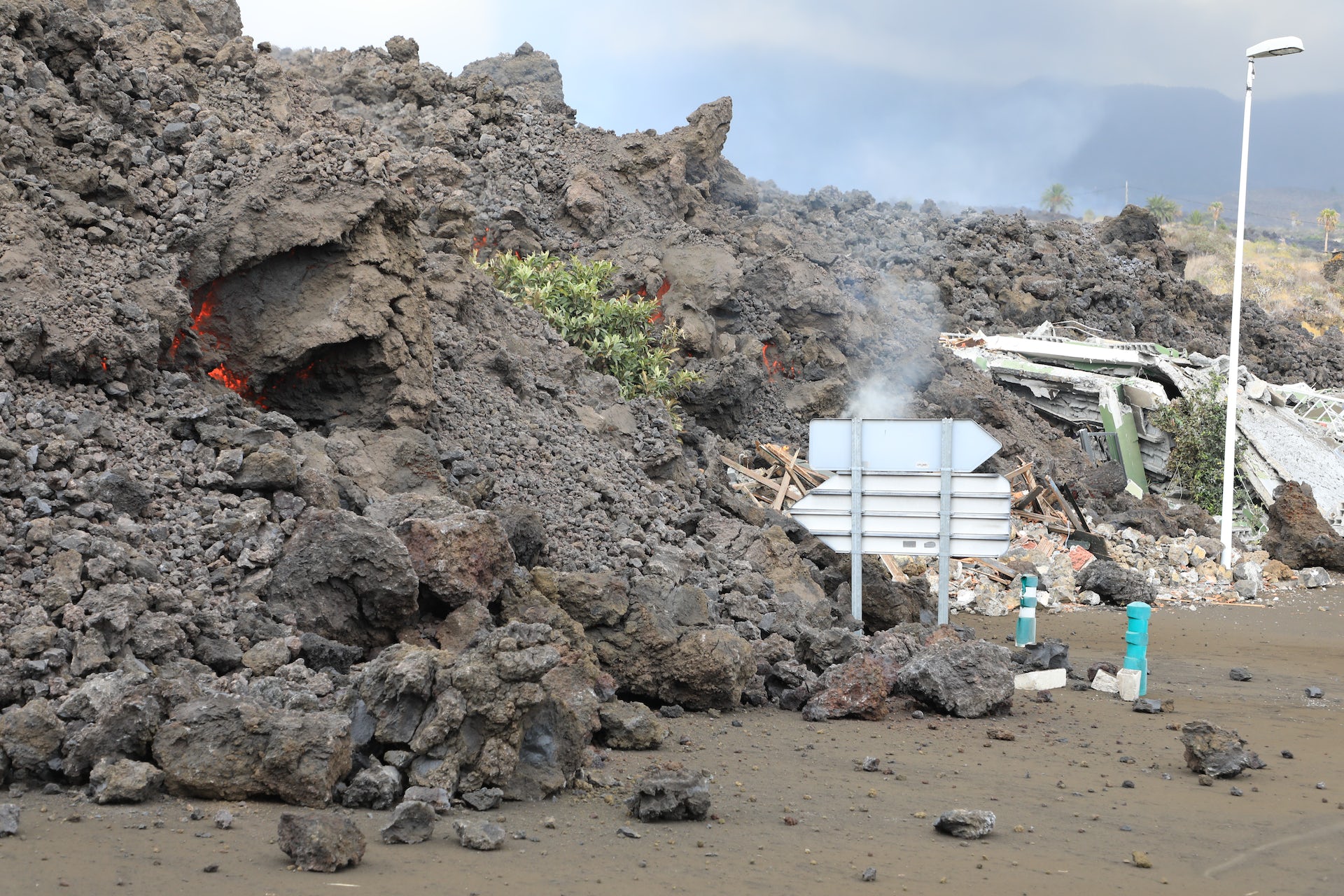 Early lavas from the 2021 La Palma eruption, with a street sign and streetlight in the right hand side of the frame