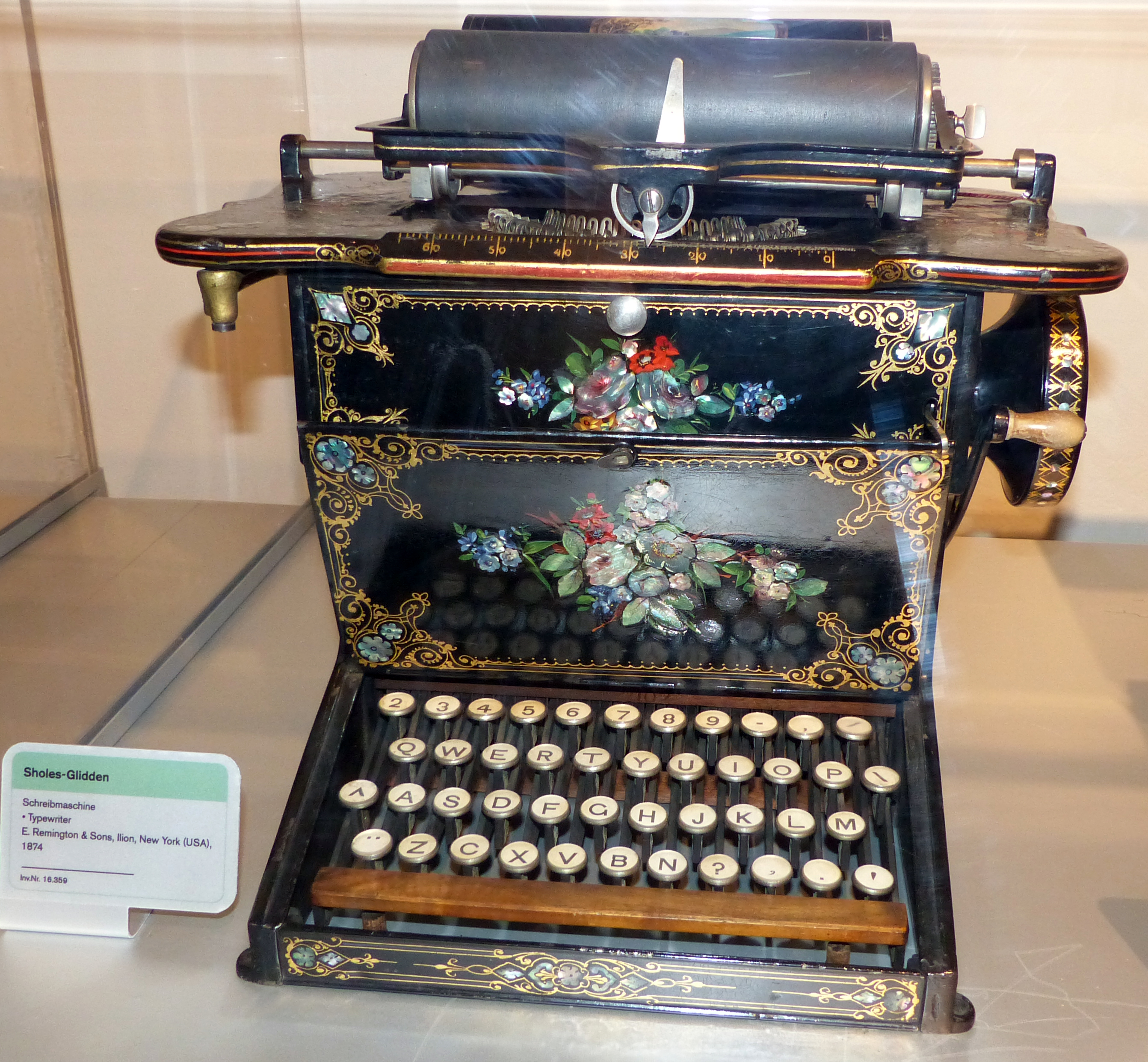 Sholes-Gidden 1874 typewriter in the original sewing machine design 