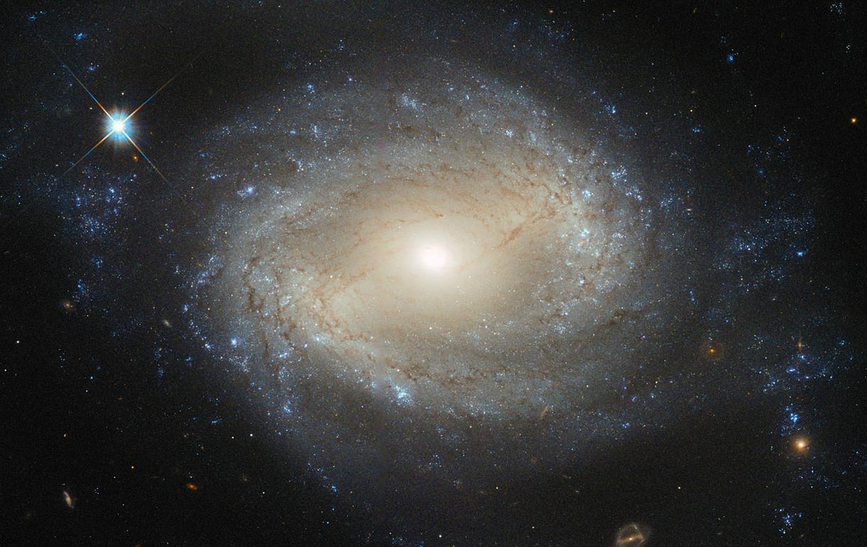 NGC 4639 is an example of a barred-spiral, 70 million light years away in the Virgo cluster