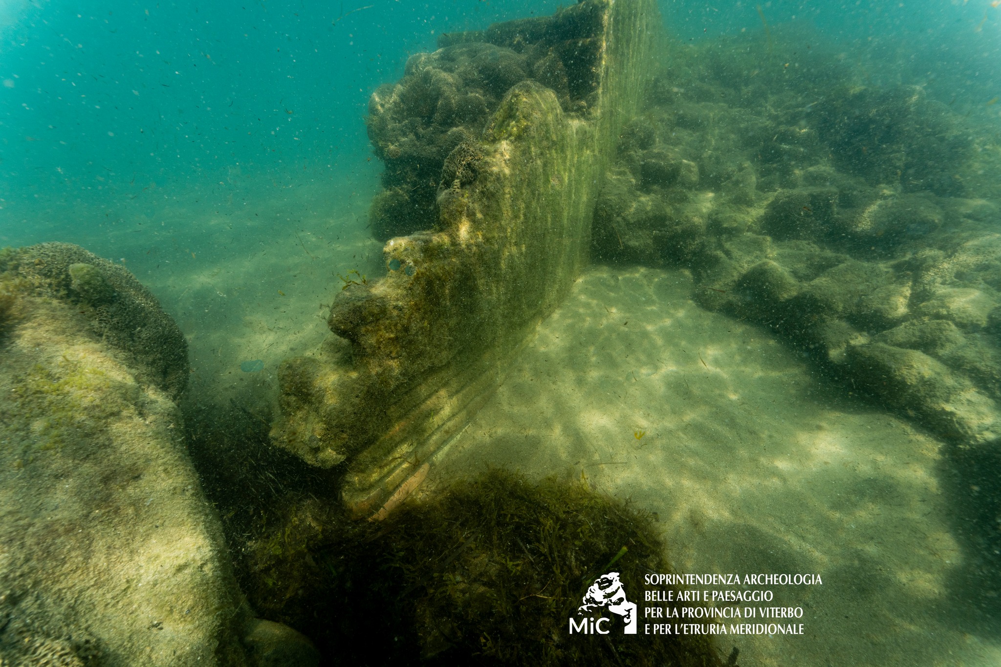 An underwater view of the chunky walls at sunken Roman ruins in Italy.