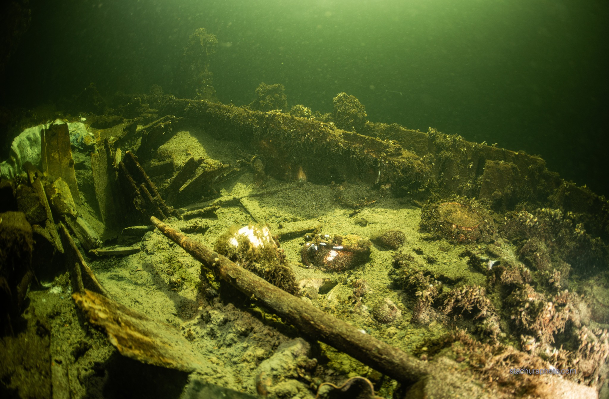 Another view of the shipwreck loaded with bottles from the 19th century.