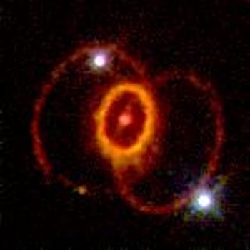 Three overlapping rings. The exterior ones are dark and red and they look like a venn diagram. The one in the middle sits partly on the overlap and is much smaller and brighter.