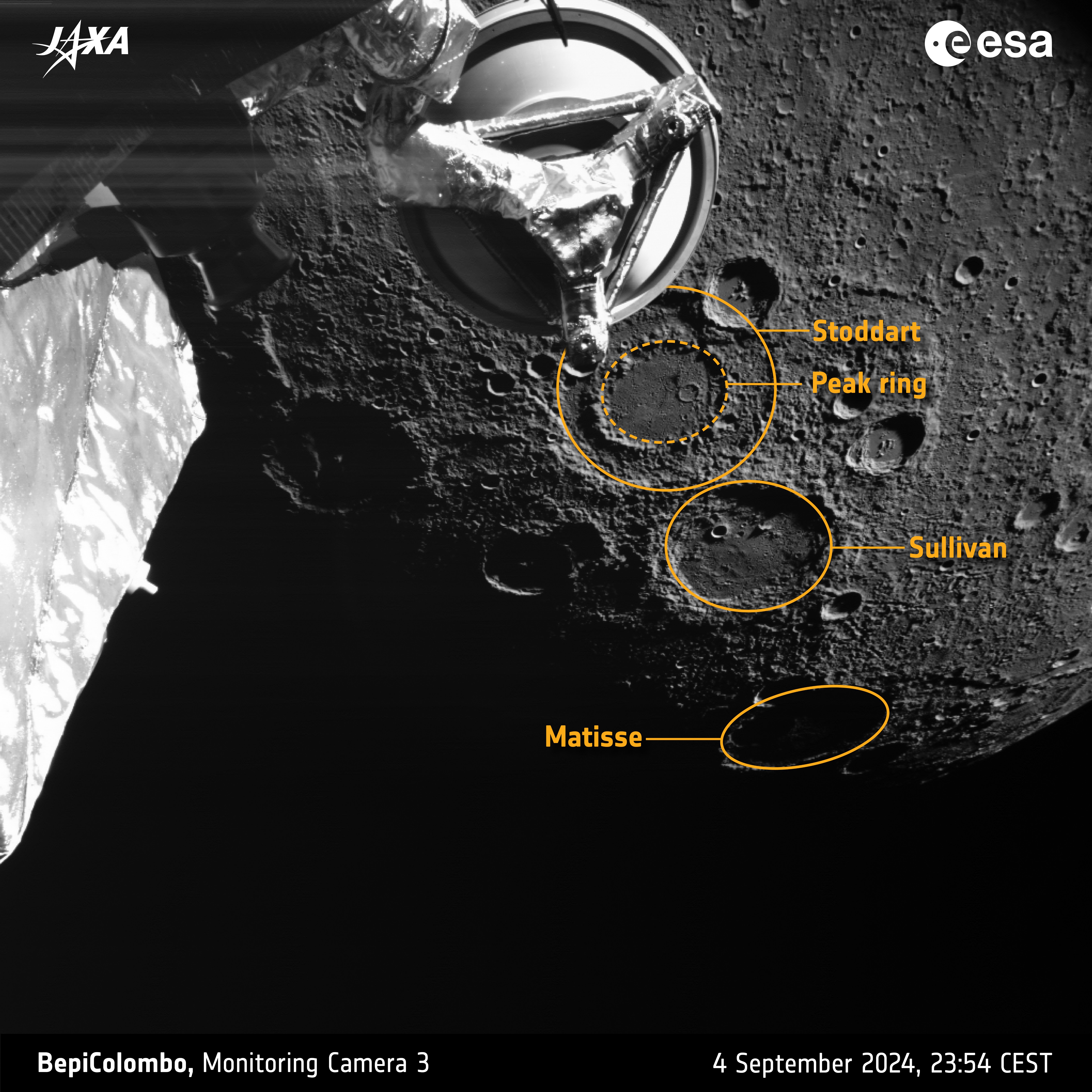 Planet Mercury in the background with its grey, cratered, pock-marked surface. In the foreground are some spacecraft parts. Stoddart crater is also donut shaped like a ring inside a ring, but smaller than vivaldi. next to it a similar size Sullivan and slight further north in the shae the Matisse crater