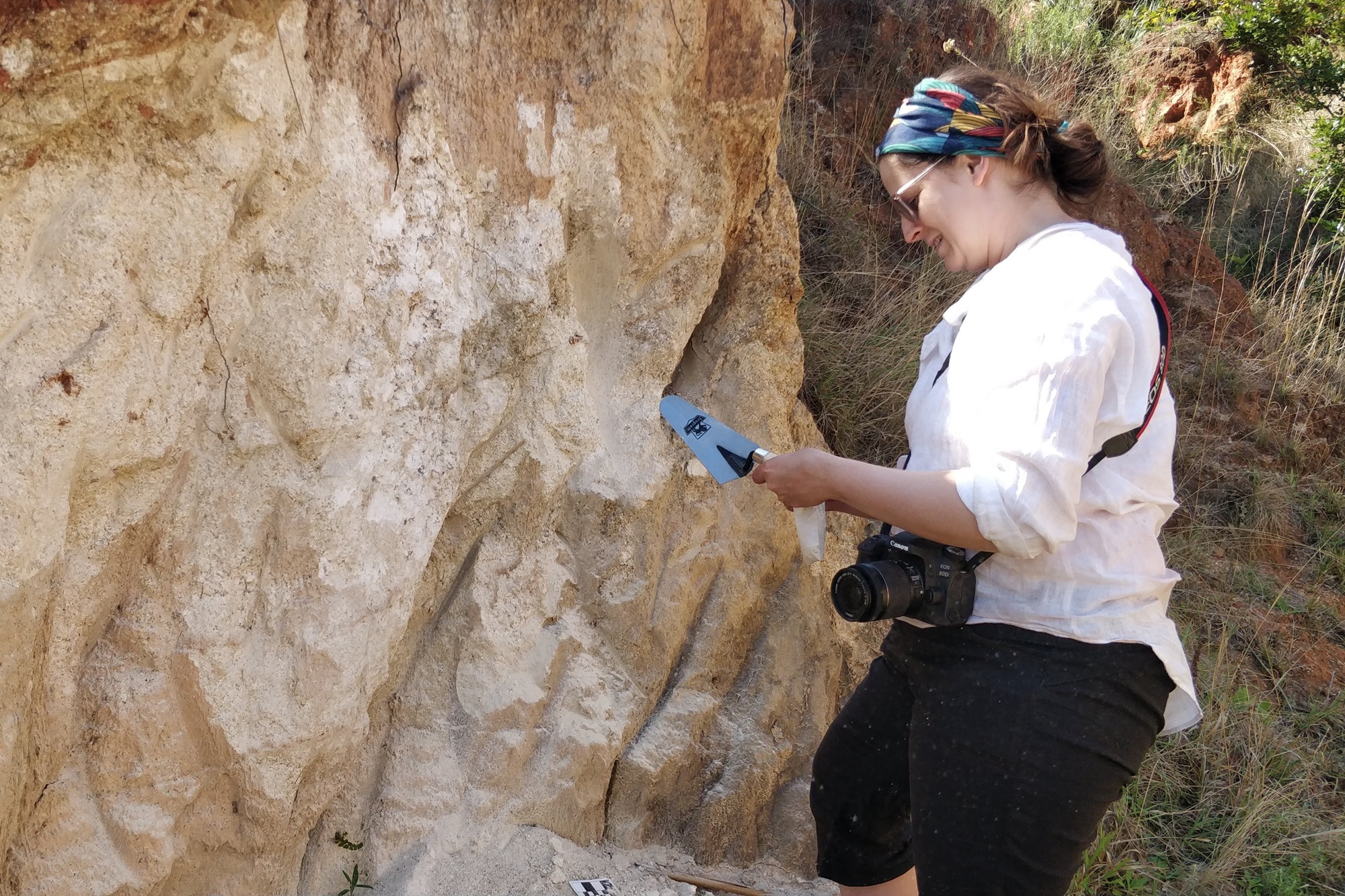 Brandi L. MacDonald collects ochre and clay raw materials in Eswatini, southern Africa, for the study.