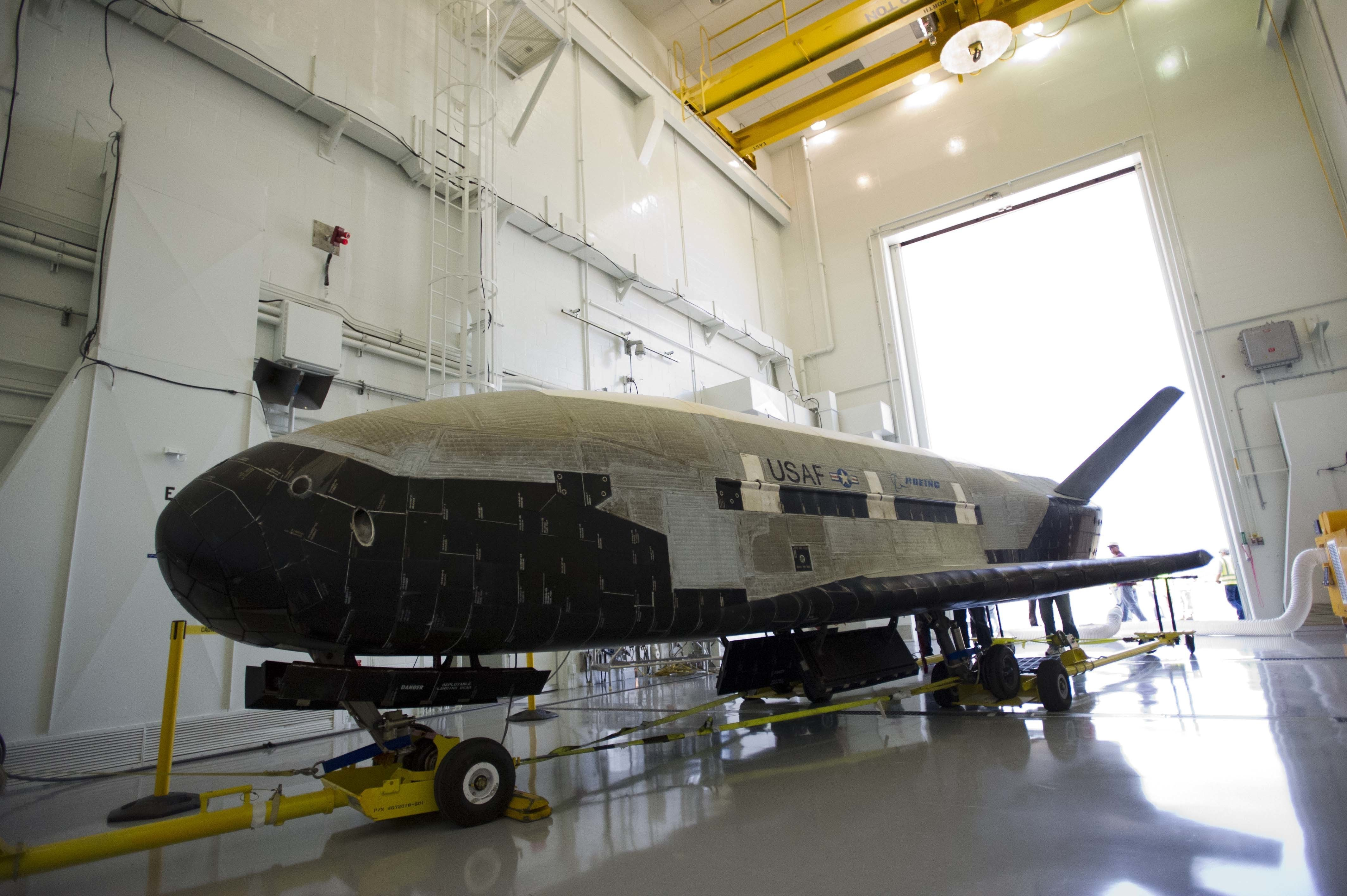 X-37B sits in a hangar after completing a previous flight.