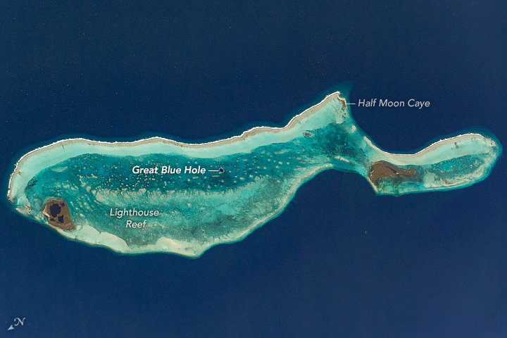 A photograph of Belize Barrier Reef Reserve System, featuring the Great Blue Hole, seen from the International Space Station March 5, 2020