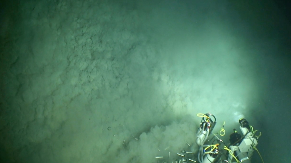 A seafloor mud volcano releases methane-rich fluids from deep below, creating a dynamic intersection between the subsurface and surface worlds. These sites often become thriving hubs of life in the otherwise desolate deep ocean. 