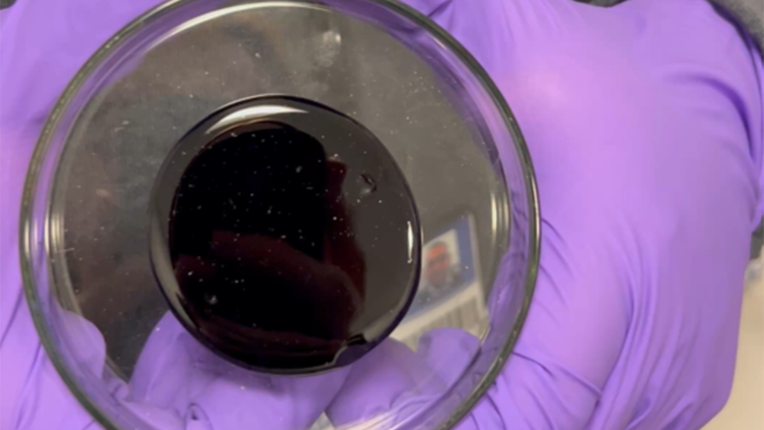 Bitumen in a petri dish.