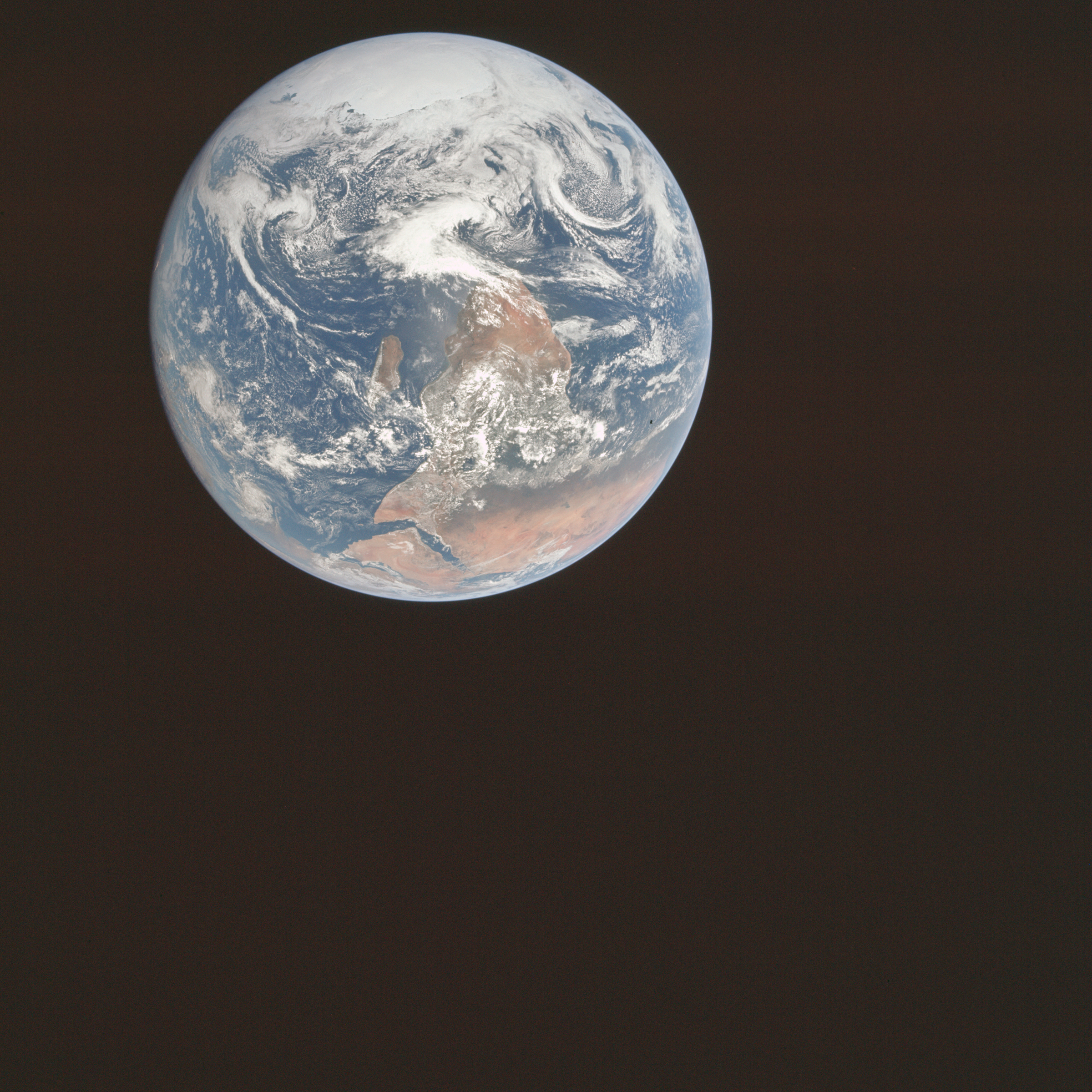 The original blue marble, an image of the Earth seen from space with Antarctica at the top and most of Africa visible below it.