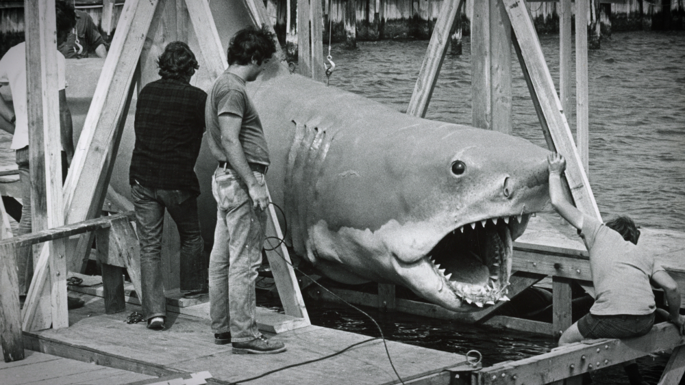 JAWS crew examines mechanical shark on set JAWS crew examines mechanical shark on set