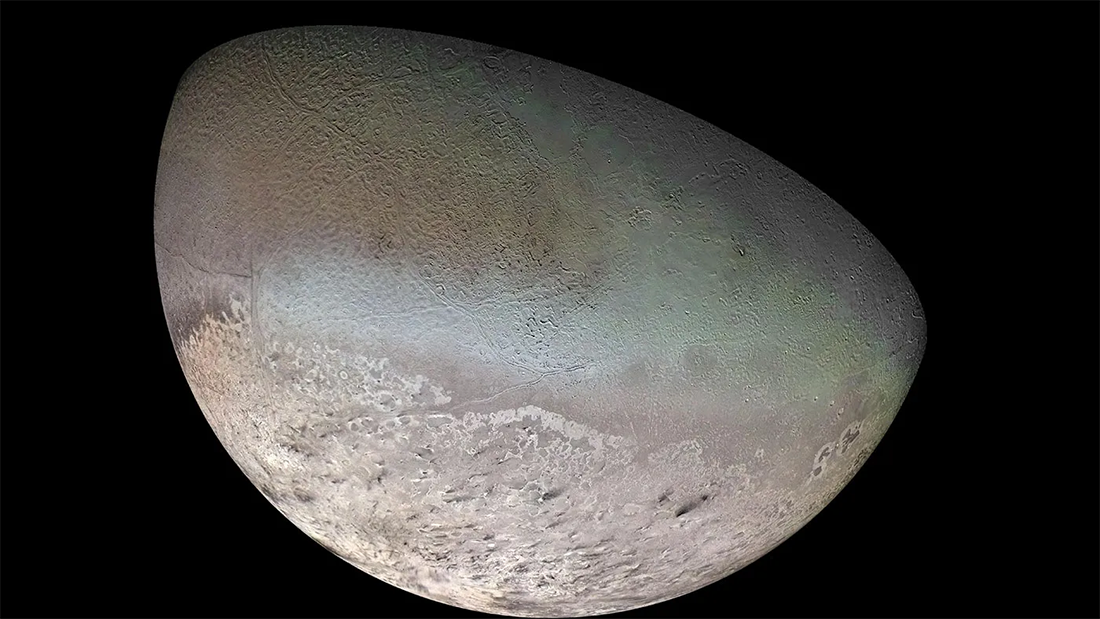 Neptune's largest moon – Triton – imaged by Voyager 2. Neptune's largest moon – Triton – imaged by Voyager 2.