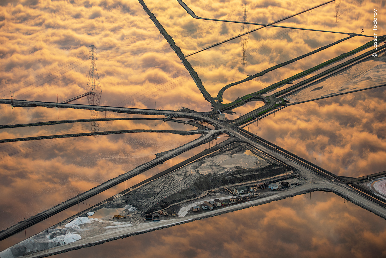 Clouds reflected in salt ponds that span San Francisco Bay. Clouds reflected in salt ponds that span San Francisco Bay.