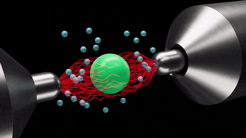 A green sphere is within red lines and vibrates slowly passing the energy onto blue spheres representing the air. When the lines become bigger and more chaotic, the sphere moves faster pushing more air around. A green sphere is within red lines and vibrates slowly passing the energy onto blue spheres representing the air. When the lines become bigger and more chaotic, the sphere moves faster pushing more air around.