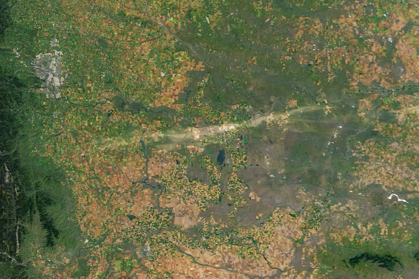 Satellite image of Alberta, Canada, taken on August 24 2025, showing a scar across the landscape left by a hailstorm. Satellite image of Alberta, Canada, taken on August 24 2025, showing a scar across the landscape left by a hailstorm.