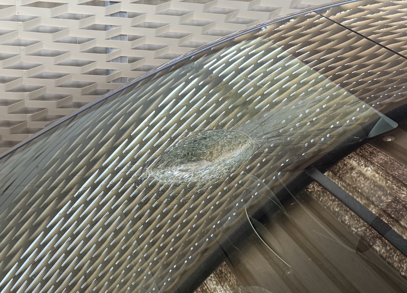 The cratering of the windscreen doesn't look like what repairers are familiar with.