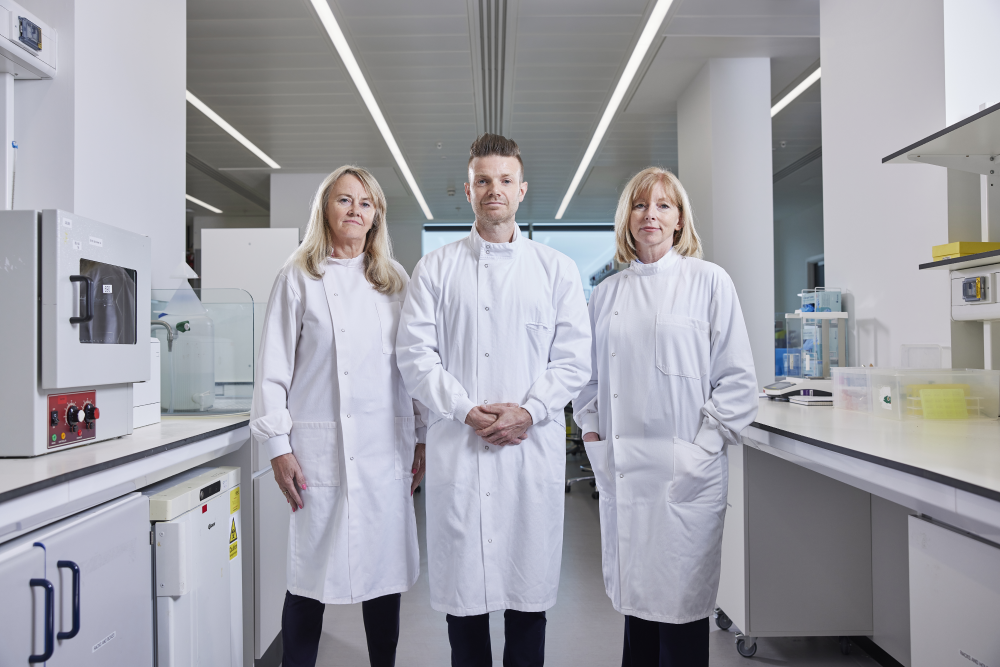 prof caroline dive with other cancer research specialists